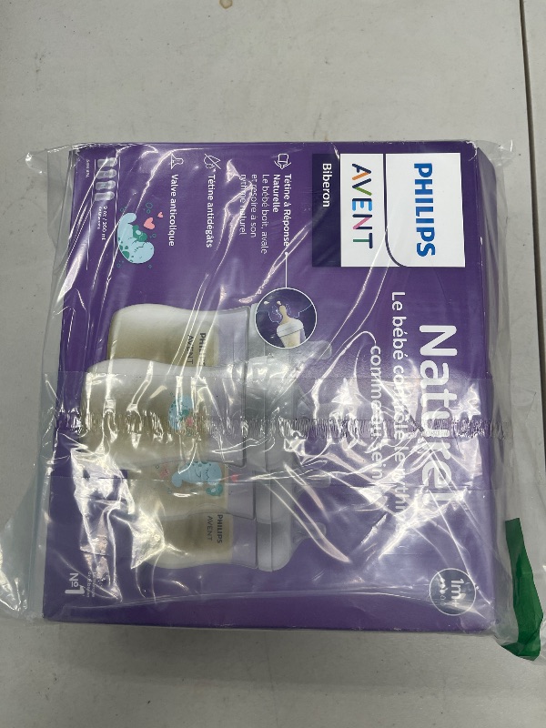 Photo 1 of Philips Avent Natural Baby Bottles with Natural Response Nipples (Medium Flow, Flow 3), 9oz, 4-Pack, SCY903/04