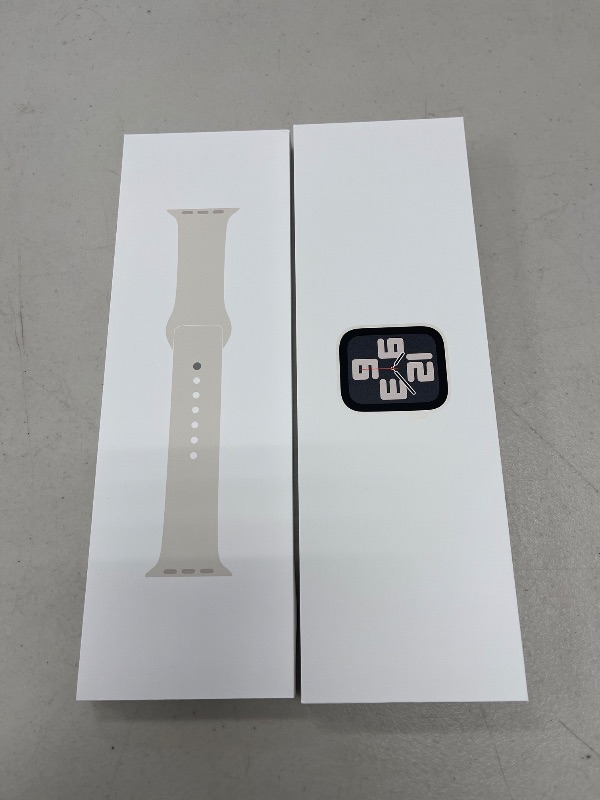 Photo 1 of Apple Watch SE (2nd Gen) [GPS 40mm] Smartwatch with Starlight Aluminum Case with Starlight Sport Band S/M. Fitness and Sleep Trackers, Crash Detection, Heart Rate Monitor, Retina Display