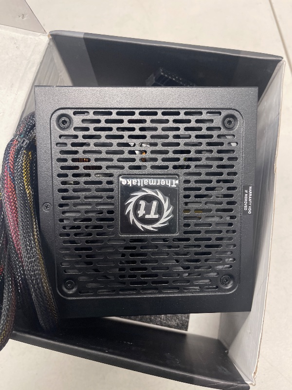 Photo 1 of Thermaltake Toughpower GX2 80+ Gold 600W SLI/Crossfire Ready Continuous Power ATX 12V V2.4/EPS V2.92 Non Modular Power Supply 5 Year Warranty PS-TPD-0600NNFAGU-2