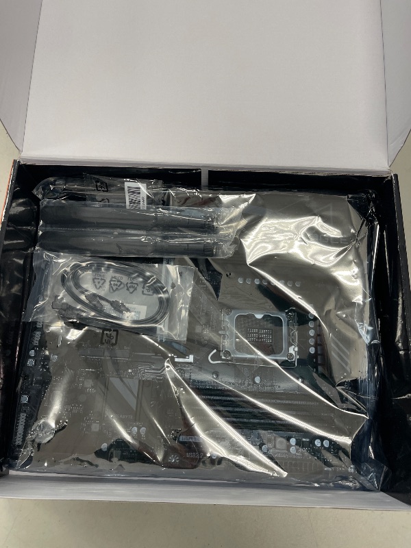 Photo 1 of GIGABYTE Z790 Eagle AX LGA 1700 Intel Z790 ATX Motherboard with DDR5, M.2, PCIe 5.0, USB 3.2 Gen2X2 Type-C, Intel Wi-Fi 6E, 2.5GbE LAN, Q-Flash Plus, EZ-Latch