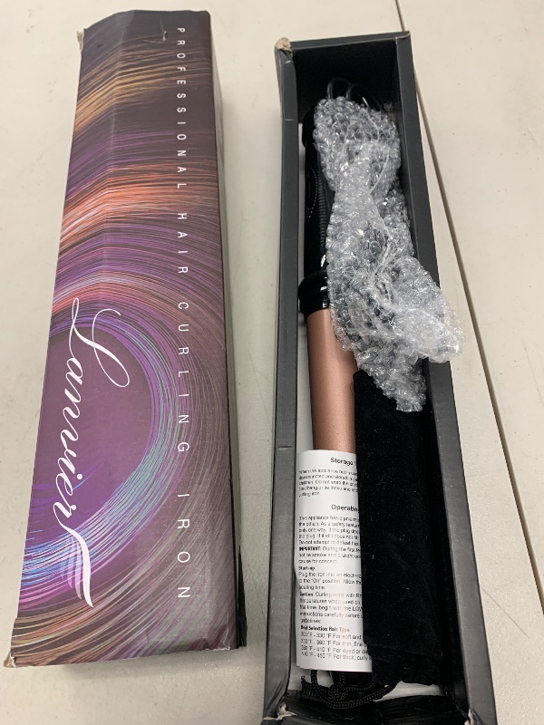 Photo 1 of CURLING IRON