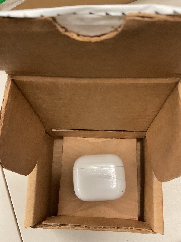 Photo 1 of Apple AirPods with Lightning Charging Case (3rd Generation) (Renewed)