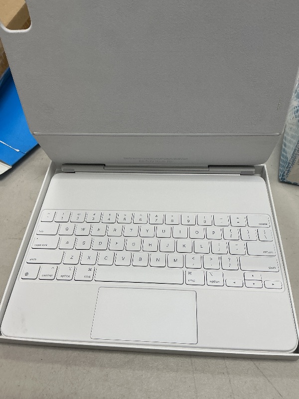 Photo 1 of Apple Magic Keyboard: iPad Keyboard and case for iPad Pro 12.9 inch (3rd, 4th, 5th and 6th gen) and iPad Air (M2), Great Typing Experience, Built-in trackpad, US English - White