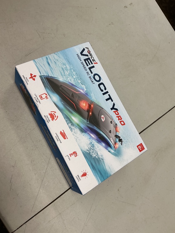 Photo 1 of Force1 Velocity Pro LED RC Boat- Remote Control Boats for Adults and Kids, Underwater Speed Racing Mini RC Toy for Pools and Lakes, LEDs, 2.4GHZ Transmitter, Rechargeable Batteries, Low Battery Alert