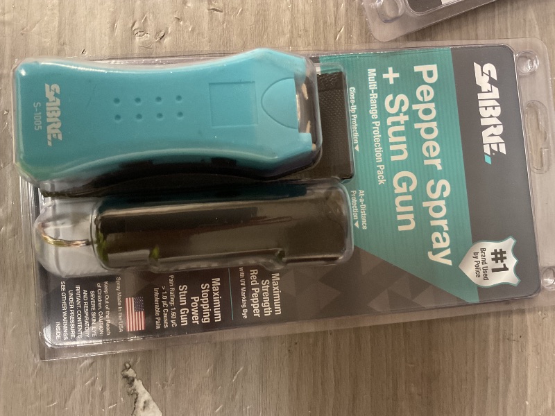 Photo 1 of SABRE RED Pepper Spray and Stun Gun with Flashlight Kit