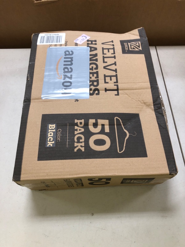 Photo 1 of Zober Velvet Hangers 50 Pack - Black for Coats, Pants & Dress Clothes - Non Slip w/ 360 Degree Swivel, Holds up to 10 lbs - Strong Felt Hangers for Clothing