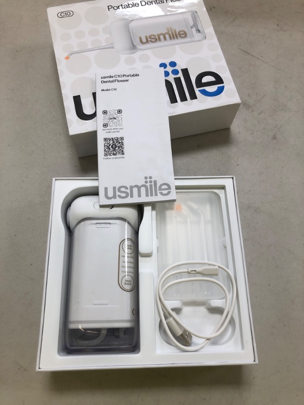Photo 1 of usmile C10 Portable Water Flosser – Travel-Friendly, 95-Day Battery, 4 Modes, 360° Nozzle, 180ml Tank, IPX7 Waterproof, Dentist-Recommended for Braces, Implants & Sensitive Gums (White)