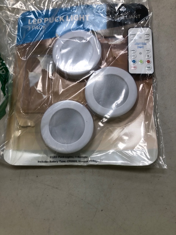 Photo 1 of Brilliant Evolution Wireless LED Puck Light 3 Pack | Works with Remote Control | Under Cabinet, Closet Light | Battery Powered | Under Counter Lighting | Stick On Lights