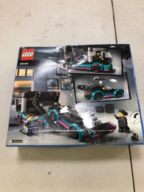 Photo 1 of LEGO City Race Car and Car Carrier Truck Toy Playset, Vehicle Transporter with Adjustable Loading Ramp and Race Car Toy, Racer and Driver Minifigures, Fun Gift for Kids Ages 6 and Up, 60406