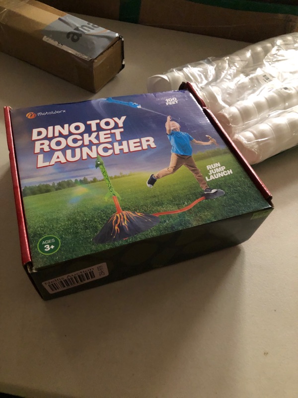 Photo 1 of Dinosaur Toy Rocket Launcher for Kids - Toys for Kids 3-5 5-7 4-6 - Outdoor Toys for Kid Ages 4-8 - 3 4 Year Old Boy Birthday Gift - Gifts for Boys Age 3 4 5 6 Years - Outside Toy for Toddlers