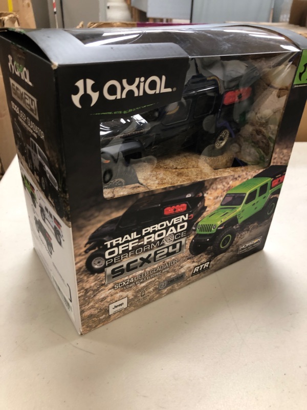 Photo 1 of Axial RC Truck SCX24 Jeep Gladiator 4 Wheel Drive Rock Crawler Brushed RTR (Nothing Needed to Complete Ready-to-Run), Black, AXI00005V2T5, Remote Control Car, RC Car, RC Crawler