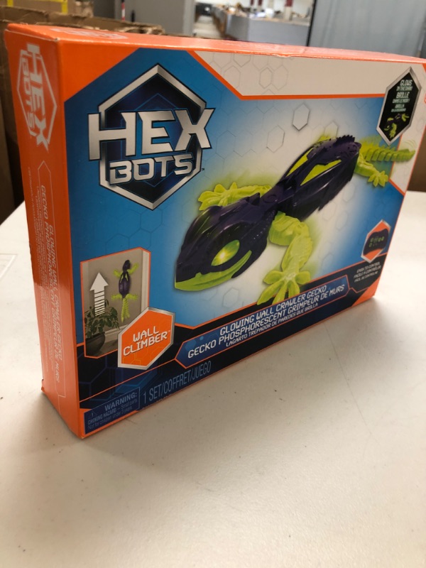 Photo 1 of HEX BOTS Glow-in-The-Dark Gecko, Rechargeable Remote Control Robot Kids Toys, Climbs up Walls for Prank Toys & Games, RC Robot for Boys & Girls Ages 4 & Up
