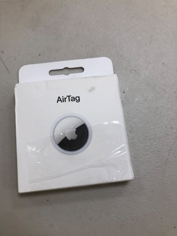 Photo 1 of Apple AirTag. Keep Track of and find Your Keys, Wallet, Luggage, Backpack, and More. Simple one-tap Set up with iPhone or iPad