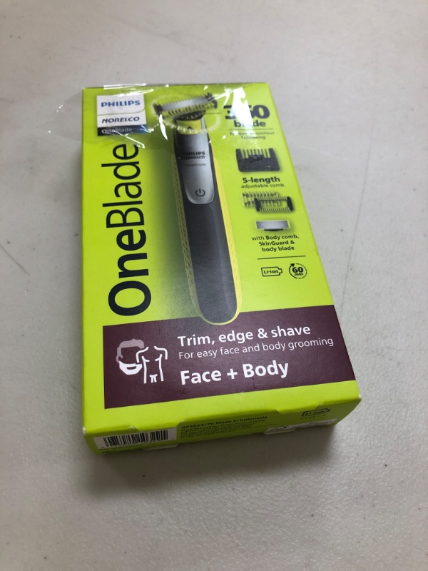 Photo 1 of Philips Norelco OneBlade 360 Hybrid Blade for Face + Body, Electric Beard Trimmer, Shaver and Groomer, with 360 Blade Technology, 5in1 Adjustable Comb, 1x Body Kit, Model QP2834/70, Black/Lime Green