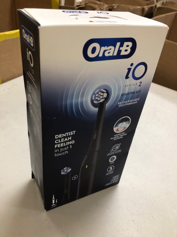 Photo 1 of Oral-B iO Series 2 Rechargeable Electric Powered Toothbrush Starter Kit, Night Black with 2 Brush Heads - Automatic Pressure Sensor to Protect Gums - 3 Modes - 2 Min Timer