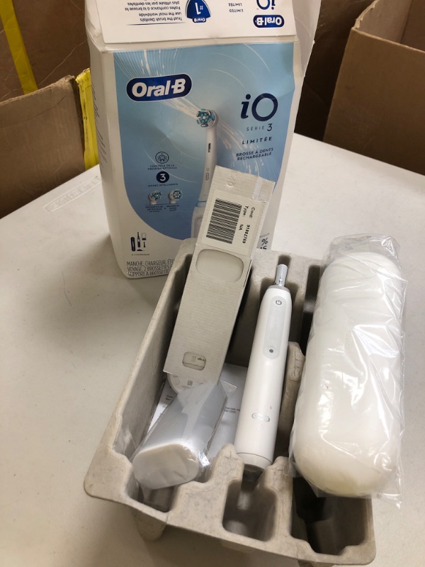 Photo 1 of Oral-B iO Deep Clean Rechargeable Electric Powered Toothbrush, White with iO Series 3 Limited, 2 Brush Heads and Travel Case - Pressure Sensor to Protect Gums - 3 Cleaning Settings - 2 Minute Timer