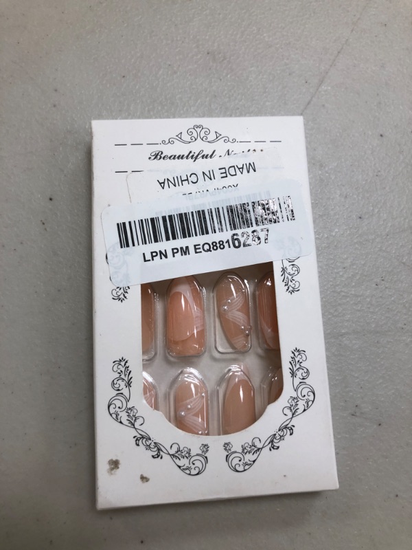 Photo 1 of 24Pcs White French Tip Press on Nails Medium Almond Fake Nails with Pearl Ribbon Designs Stick on Nails French False Nails Full Cover Nude Acrylic Nails Glossy Glue on Nails for Women Nail Decoration