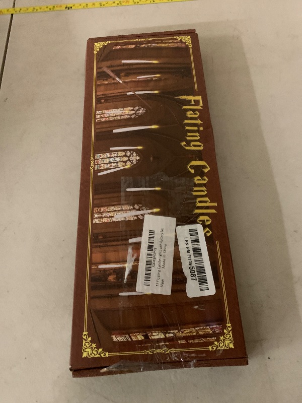 Photo 1 of 12 Pcs Floating Candles with Magic Wand Remote, Battery (included) Operated Hanging LED Candles Lasting for 200 H, Flameless Flickering Warm Light Taper Candle Set for Xmas Festival Theme Party Decor