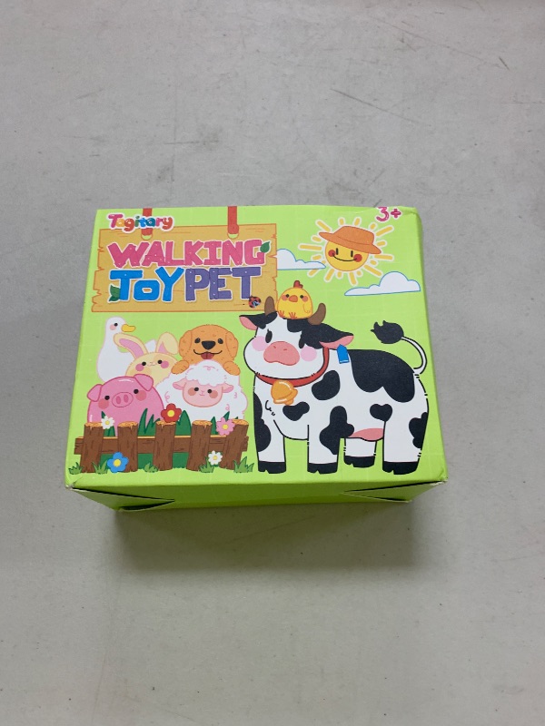 Photo 1 of Tagitary Plush Toys Interactive Toys Cow for Kids,Walking Pet Toys Can Make Sounds,Wag Tail and Nod Head, Realistic Stuffed Cattle Toys Birthday Gift for Kids Toddlers