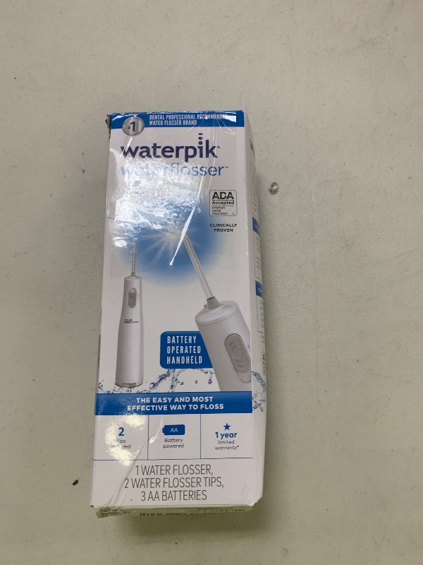 Photo 1 of Waterpik Cordless Express Water Flosser, Battery Operated & Portable for Travel & Home, ADA Accepted, Waterproof for Shower Use, White WF-02, Packaging May Vary