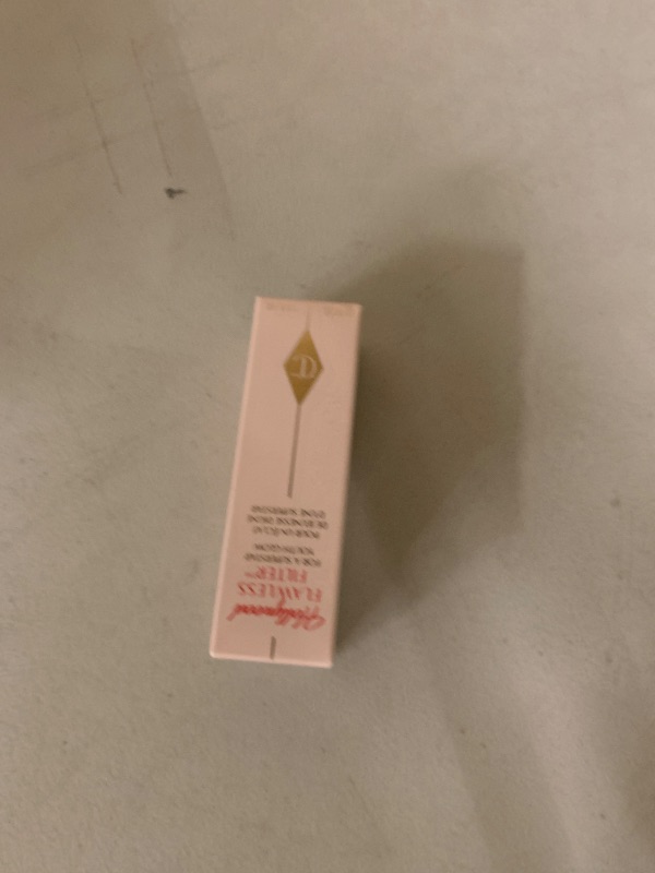 Photo 1 of Charlotte Tilbury Hollywood Flawless?Filter - Multi?Use Makeup Primer, Complexion Booster & Illuminating Liquid Highlighter with Sheer Coverage - Smooths & Blurs Skin - 4 Medium