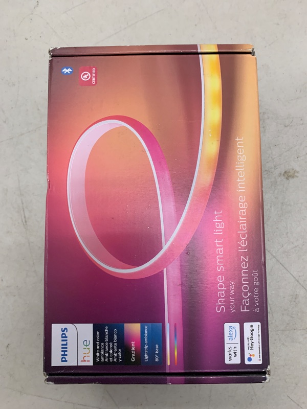 Photo 1 of Philips Hue Indoor 6-Foot Smart LED Light Strip Base Kit with Plug - Flowing Multicolor Effect - 1 Pack - Control with Hue App - Works with Alexa, Google Assistant and Apple HomeKit