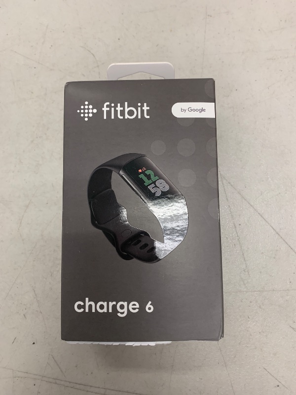 Photo 1 of Fitbit Charge 6 Fitness Tracker with Google apps, Heart Rate on Exercise Equipment, 6-Months Premium Membership Included, GPS, Health Tools and More, Obsidian/Black, One Size (S & L Bands Included)