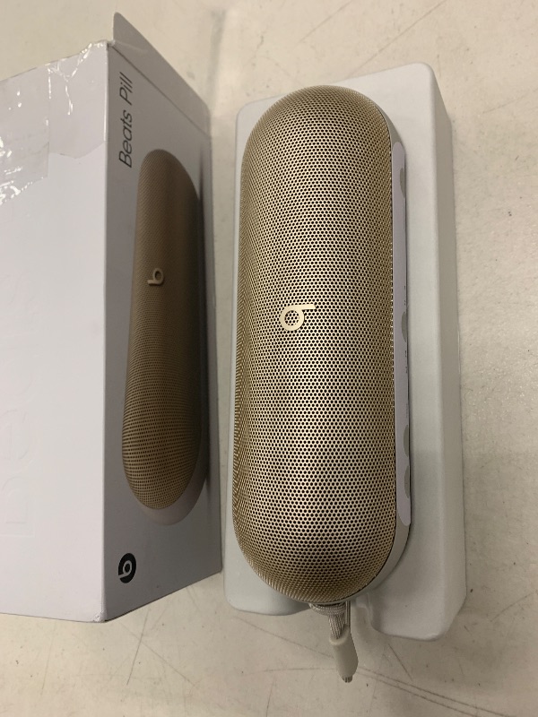 Photo 1 of Beats Pill - Portable Bluetooth Speaker- Up to 24H Battery Life, Water Resistant, Bluetooth, Apple & Android Compatible, Seriously Loud Sound for Home, Outdoor and Travel- Champagne Gold