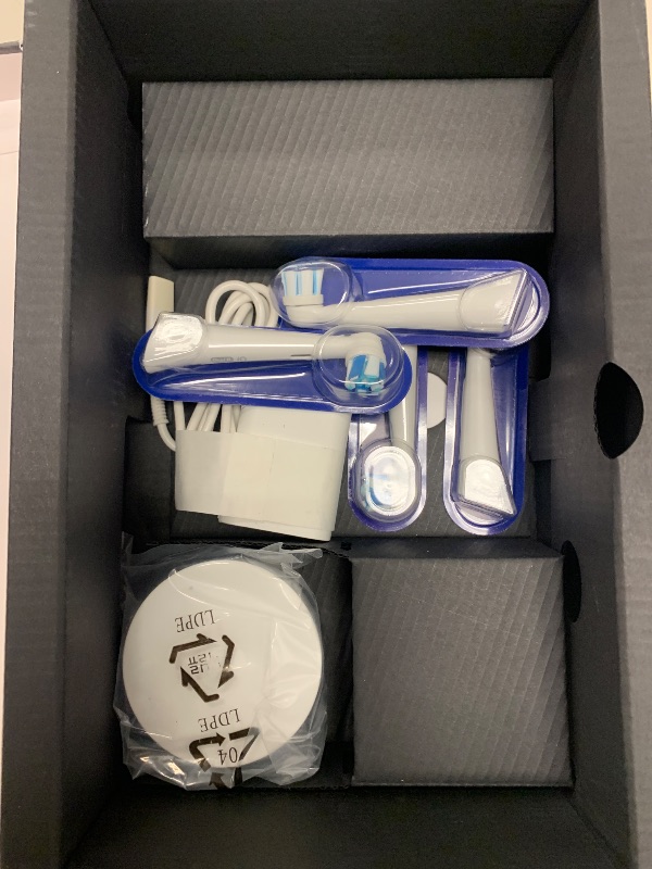 Photo 1 of Oral-B iO Series 10 Rechargeable Electric Toothbrush with Visible Pressure Sensor to Protect Gums, 2 Min Timer, 7 Cleaning Settings, 4 Replacement Toothbrush Heads, and Charging Travel Case, White