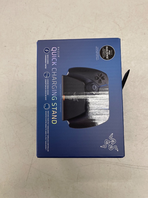 Photo 1 of Razer Quick Charging Stand for PlayStation 5: - Curved Cradle Design - Matches PS5 DualSense Wireless Controller - One-Handed Navigation - USB Powered - Black (Controller Sold Separately)