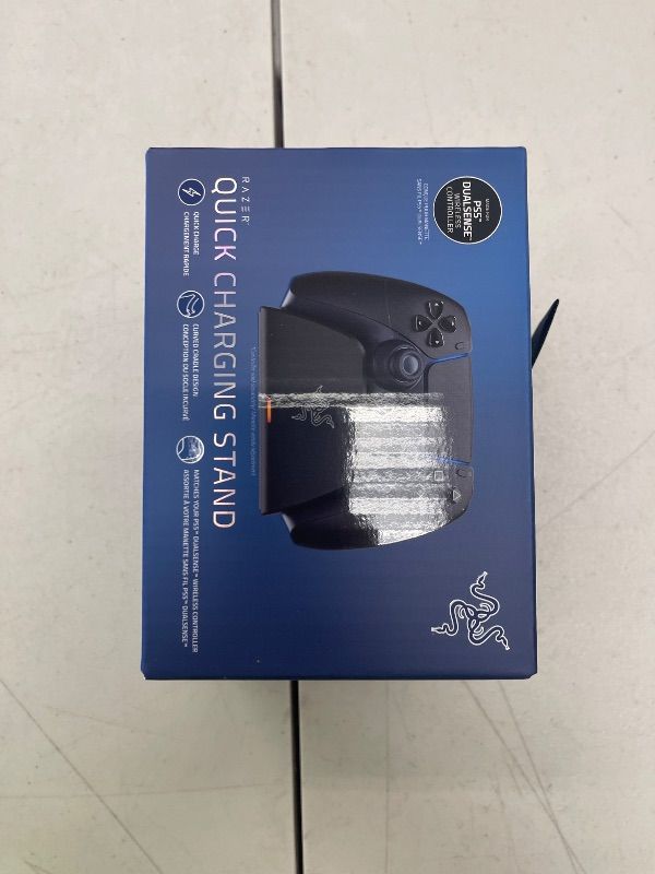 Photo 1 of Razer Quick Charging Stand for PlayStation 5: - Curved Cradle Design - Matches PS5 DualSense Wireless Controller - One-Handed Navigation - USB Powered - Black (Controller Sold Separately)