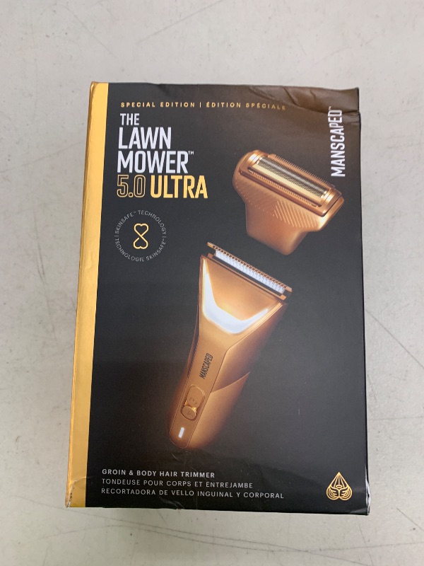 Photo 1 of MANSCAPED® The Lawn Mower® 5.0 Ultra Groin & Body Hair Trimmer – Dual-Head SkinSafe® Trimmer & Foil Blades, Waterproof Groomer, USB-C Rechargeable with Travel Case, Men’s Ball Shaver, Forged Gold