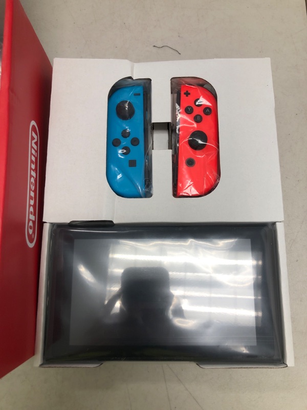 Photo 1 of Nintendo Switch™ with Neon Blue and Neon Red Joy?Con™