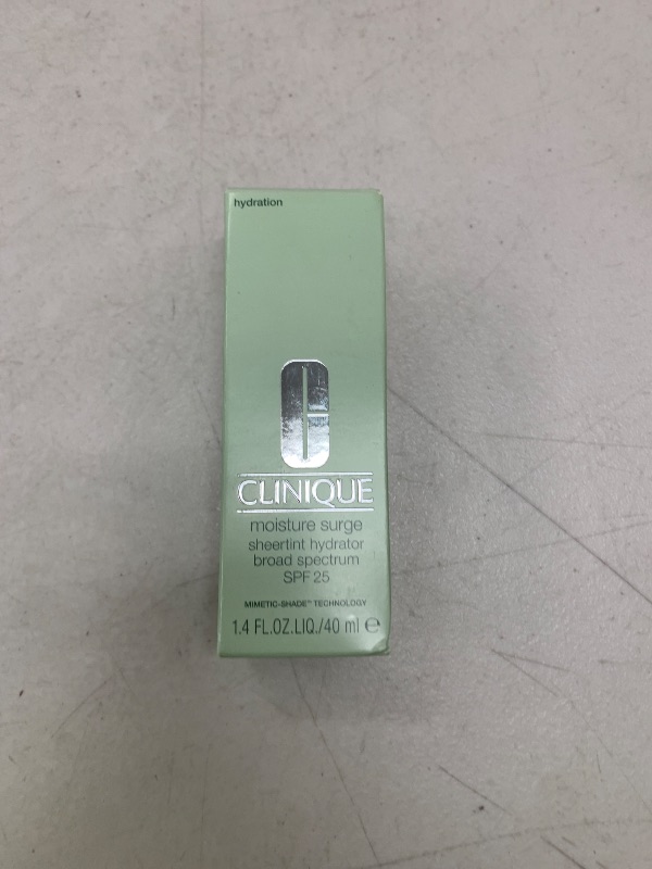 Photo 1 of Clinique Moisture Surge Sheertint Hydrator Hydrating Tinted Moisturizer Broad Spectrum SPF 25 With Hyaluronic Acid + Aloe Water | Sheer Coverage, Natural Finish, Universal Deep, 1.4 Fl Oz