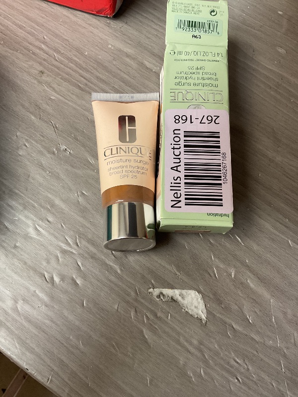 Photo 1 of Clinique Moisture Surge Sheertint Hydrator Hydrating Tinted Moisturizer Broad Spectrum SPF 25 With Hyaluronic Acid + Aloe Water | Sheer Coverage, Natural Finish, Universal Deep, 1.4 Fl Oz