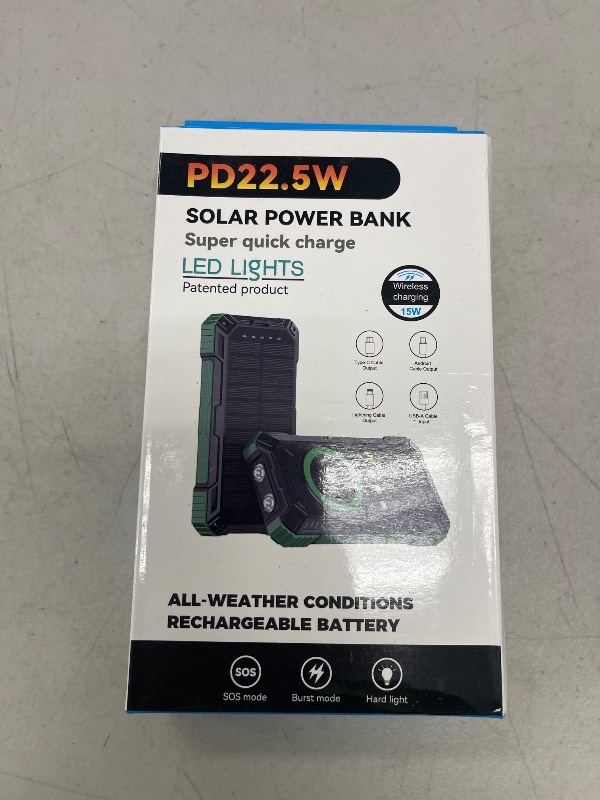 Photo 1 of Solar Charger Power Bank,36000mAh Portable Wireless Charger with USB-C in/Output,15W Fast Charging External Battery Pack Built in 4 Cables,Three Inputs Phone Portable Charger (Black, 36000mAh)