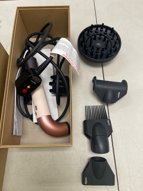 Photo 1 of Dyson Supersonic r™ Hair Dryer in Ceramic Pink and Rose Gold