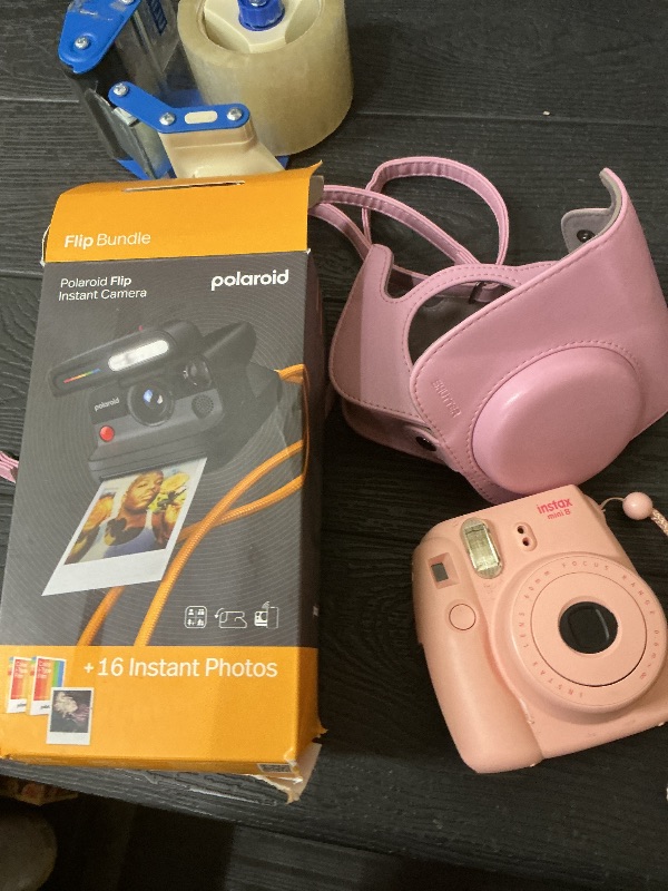 Photo 1 of Polaroid Flip Instant Camera + Color Film Bundle (16 Photos Included) - Black (6565) - Hyperfocal 4-Lens System, Sonar autofocus, and Sence Analysis with Bluetooth paired Companion app