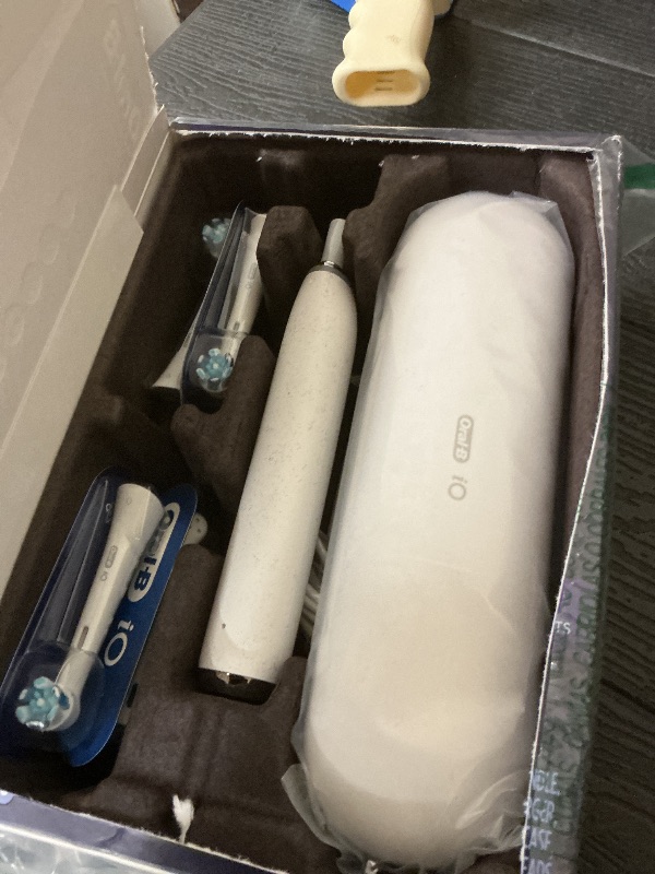 Photo 1 of Oral-B iO Series 9 Electric Toothbrush with 3 Replacement Brush Heads, White Alabaster