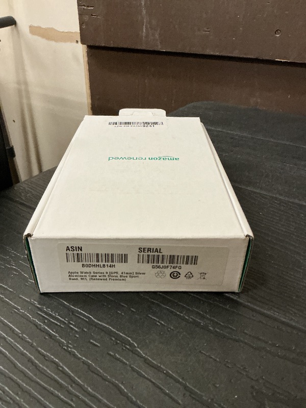 Photo 1 of Apple Watch Series 9 [GPS, 41mm] Silver Aluminum Case with Storm Blue Sport Band, M/L (Renewed Premium)