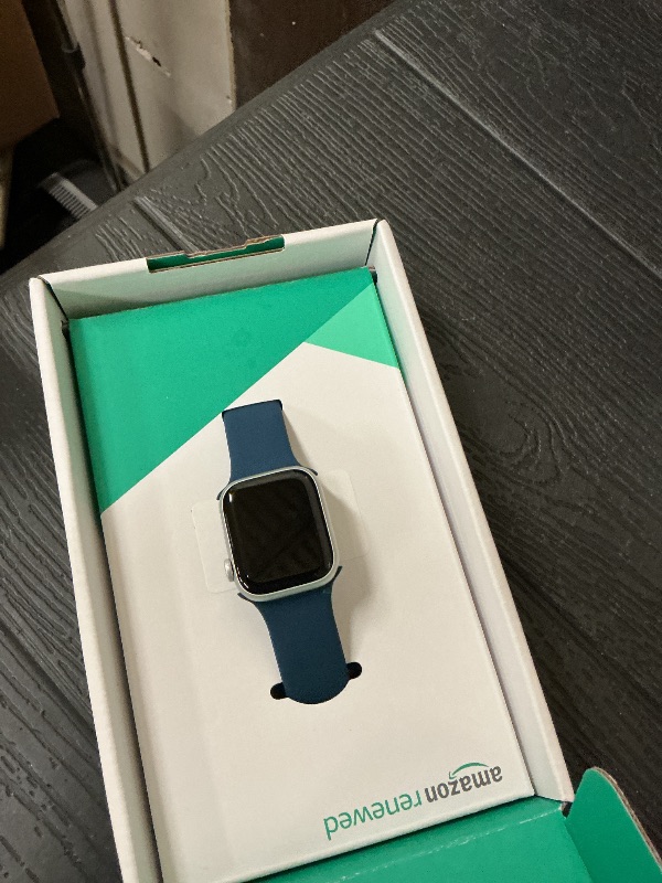 Photo 1 of Apple Watch Series 9 [GPS, 41mm] Silver Aluminum Case with Storm Blue Sport Band, M/L (Renewed Premium)