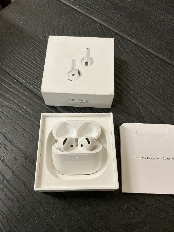 Photo 1 of Apple AirPods 4 Wireless Earbuds, Bluetooth Headphones, with Active Noise Cancellation, Adaptive, Transparency Mode, Personalized Spatial Audio, USB-C Charging Case, Wireless Charging, H2 Chip