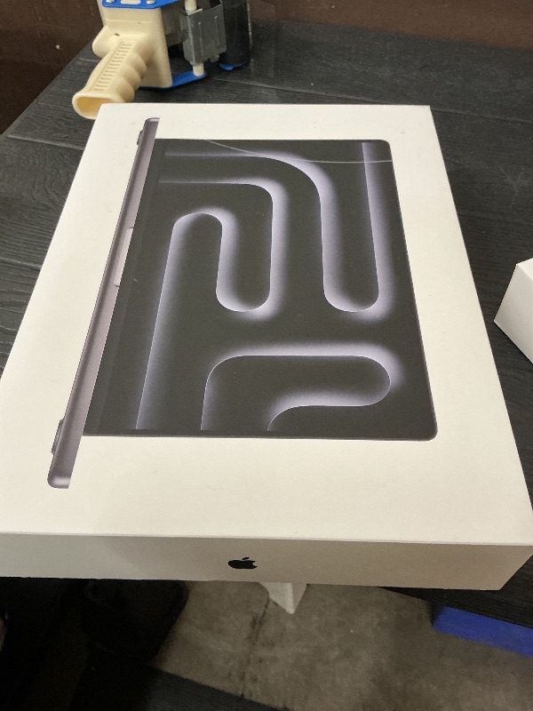 Photo 1 of Apple 2025 MacBook Pro Laptop with M5 chip with 10?core CPU and 10?core GPU: Built for Apple Intelligence, 14.2-inch Liquid Retina XDR Display, 24GB Unified Memory, 1TB SSD Storage; Space Black