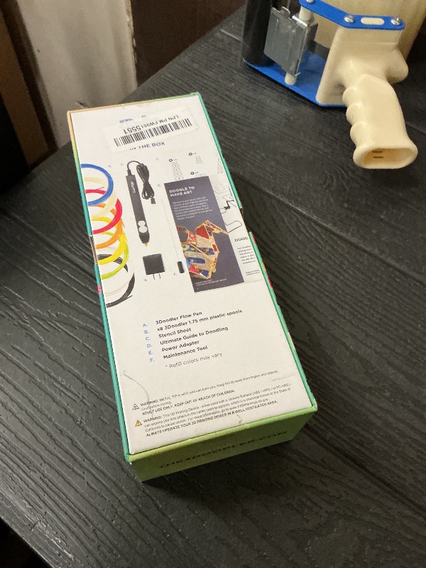 View 2 of 3Doodler Flow 3D Printing Pen for Teens, Adults & Creators – Black, with Free Refill Filaments, Stencil Book & Guide, 3.1 x 10.74 x 4.44 inches