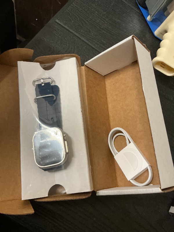 Photo 1 of Apple Watch Ultra 2 [GPS + Cellular, 49mm] - Titanium Case with Blue Ocean Band, One Size (Renewed)