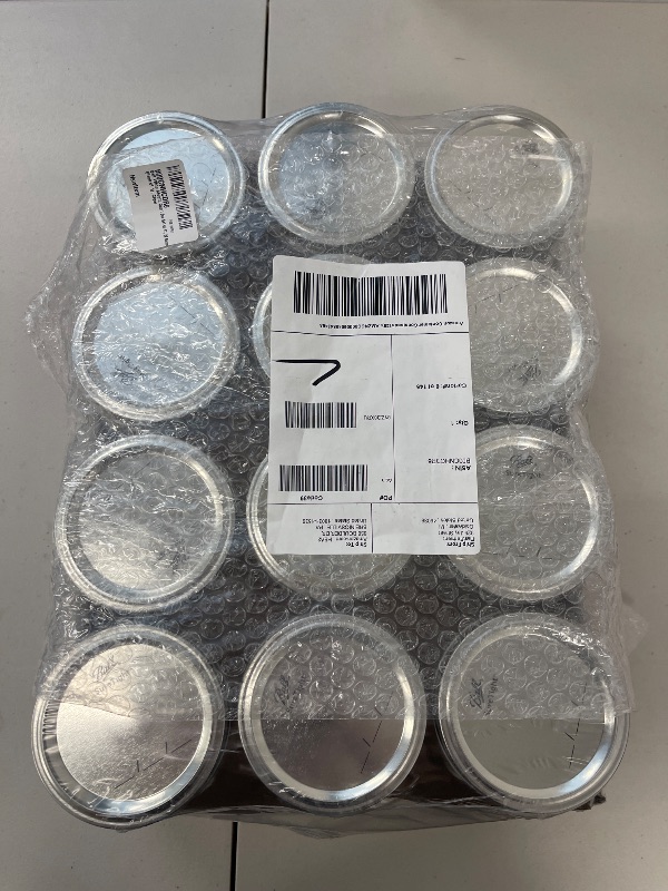 Photo 1 of Ball Wide Mouth Quart (32 oz) Jars with Lids and Bands, Set of 12
