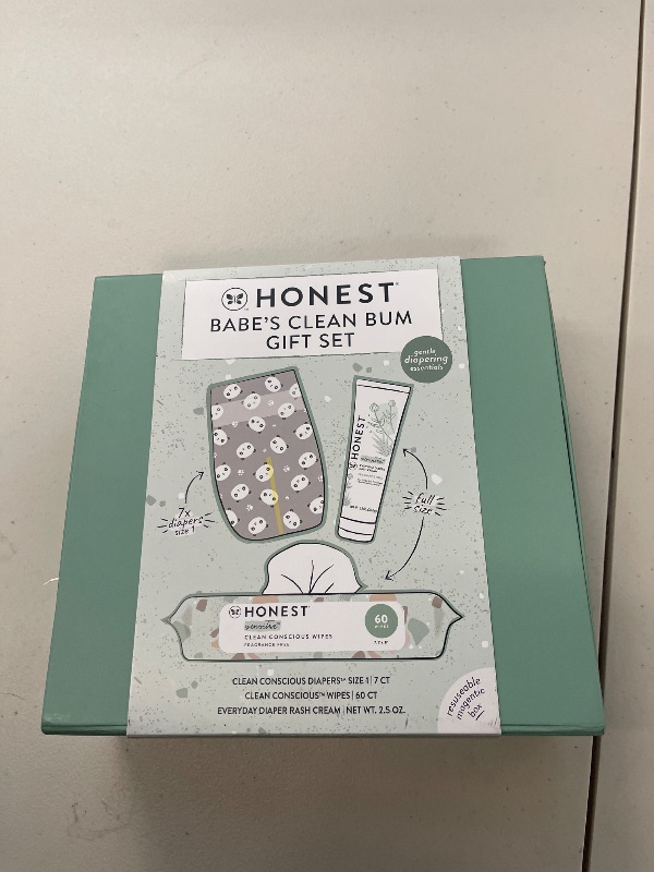 Photo 1 of The Honest Company Babe's Clean Bum Gift Set | Diapering + Newborn Essentials | 99% Water Wipes (60 ct), Diaper Rash Cream (2.5 oz), Clean Conscious Diapers (Size 1, 7 ct)
