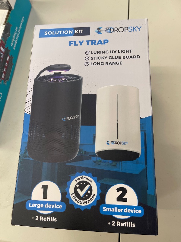 Photo 1 of Dropsky Kit Indoor Flying Insect Trap - Plug-in Bug Light Trap for Fruit Flies, Gnats and Houseflies - Odorless and Mess Free (1 Big Trap + 2 Small Traps + 4 Glue Cards)
