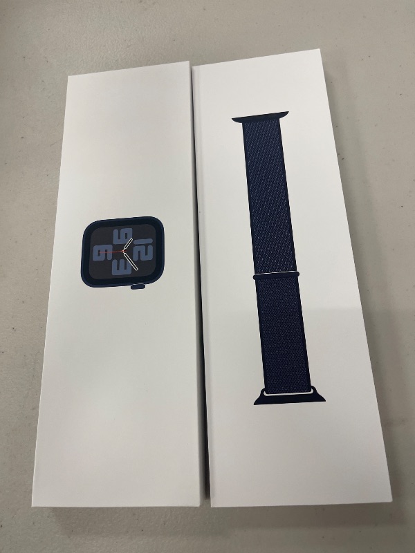 Photo 1 of Apple Watch SE (2nd Gen) [GPS 40mm] Smartwatch with Midnight Aluminum Case with Ink Sport Loop One Size. Fitness and Sleep Trackers, Crash Detection, Heart Rate Monitor, Carbon Neutral