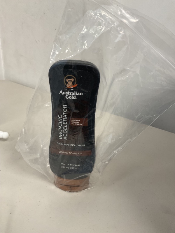 Photo 1 of Australian Gold Dark Tanning Accelerator Lotion With Bronzer, 8 Ounce, New Package Same Formula, B003GX5SSC